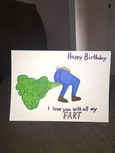 a birthday card with a drawing of a man watering broccoli on the ground