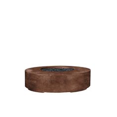 a round concrete fire pit on a white background