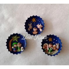 three small cupcake tins with nativity scenes in them