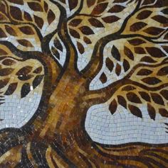 a mosaic tree with brown leaves on it