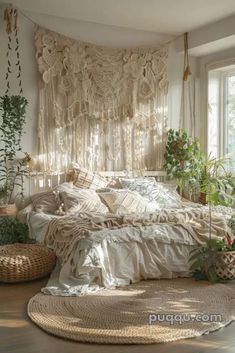 a bedroom with lots of pillows and plants in the window sill, along with round rugs on the floor