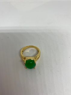 Vintage Lucky Green Nephrite Jade ring Fun jade is color enhanced Large green nephrite jade Ornate German Gold finished Vintage ring, does not tarnish, NOT sterling Size 6.5, 7 or 9 All rings are shipped free in the US in a nice gift box. Check out our over a THOUSAND great reviews Engraving is $4 per letter and is not always perfect depending on the piece. It can take a few days if the jeweler is busy. This is payable to Paypal Judithsltd@gmail.com Green Emerald Crystal Ring, Green Crystal Gemstone Ring, Green Gemstone Crystal Ring, Green Gemstone Ring With Round Band, Green Open Ring For Formal Occasions, Green Open Ring For Formal Events, Green Jade Round Band Ring, Green Jade Round Band Jewelry, Formal Green Open Ring