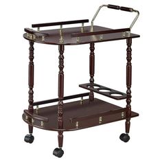 This classy serving cart will look in either your formal dining room or rec room. It features a handle pushing and top roomy top shelf for a cheese plate and two snifters of cognac. Bottom shelf includes a bottle holder for three bottles of your favorite Bordeaux andor single malt. Elegantly crafted with merlot finish and brash-finish metal accents. Gives your room a traditional countryside appeal. Color: Brown. Mobile Kitchen Island, Bar Serving Cart, Wood Bar Cart, Serving Bar, Serving Cart, Furniture Classic, Serving Table, Coaster Furniture, Cheese Plate