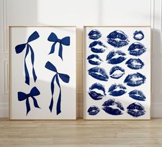 two framed art pieces with blue lipstick prints on them