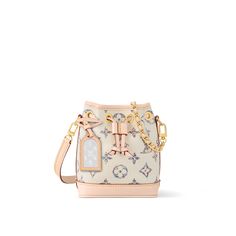 LOUIS VUITTON® - Nano Noé - Multicolore Blanc Louis Vuitton Mini Backpack White, Louis Vuitton Sac, Louis Vuitton Gifts, Micro Bags, Trunk Bag, Luxury Purses, Best Wallet, Fancy Bags, Wallet Pouch