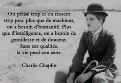 a man sitting on top of a beach next to a quote from charlie chapin