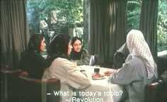 three women sitting at a table talking to each other with the caption what is today's role revolution?