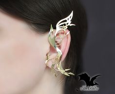 "Ear Cuff \"Flight of the Phoenix\" - rebirth. Made by hand on the individual sizes. This ear cuff shows a flying phoenix as a symbol of rebirth. The Phoenix or the Firebird is the personification of fire and endless rebirth. Possible materials of manufacture: \"Silver\" -  Nickel Silver (Jewelry alloy of silver color, does not contain silver. Other name: Maillechort, German silver.) \"Gold\" - Brass (Jewelry alloy of gold color) \"Sterling Silver\" - 925 Sterling Silver (This is a precious 925 alloy) All the jewelry in my shop is made by hand. With love and individually. This means that minor differences from the original are possible, but it also means that you receive a unique work of art. Term of manufacturing of the order of 2-4 weeks. I understand that this is a long time. But manual Ear Cuffs, Phoenix Rebirth, The Firebird, Phoenix Jewelry, Wrap Earrings, Unique Handmade Jewelry, Nickel Silver, German Silver, Firebird