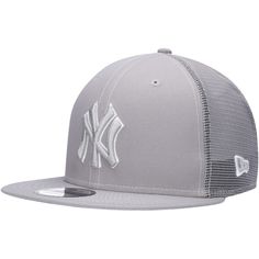 the new york yankees'grey and white trucker hat is shown in front of a white