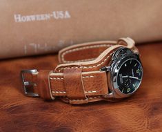 Horween Derby leather watch band of High quality. Thick bund strap handmade is unique, there cannot be two identical such straps. The strap is very thick, durable, soft, supple, has a beautiful appearance and pleasant to the touch texture. Compatible with watch case 18 mm, 20 mm, 22 mm, 24mm. Soft and supple leather cuff watch strap Fits perfectly on your wrist and looks stylish, making your watch stand out from the rest. A handmade watch strap is a luxurious and thoughtful Gift for a dear perso Distressed Brown Leather Strap Watch Accessories, Steampunk Leather Strap Watch Accessories, Leather Wrist Strap For Watches, Everyday Use, Brown Cuff Leather Strap For Watch, Hand-tooled Brown Leather Watch Bands, Handmade Watch Strap, Leather Industry, Leather Company, Cuff Watch