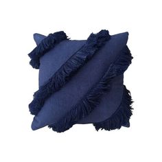 a blue pillow with fringes on it