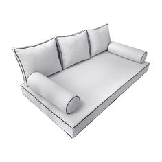 a white couch with pillows on it