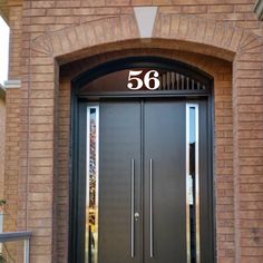 an entry door with the number 66 on it