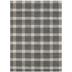 a black and white checkered rug on a white background