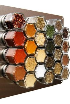 a spice rack filled with lots of different kinds of spices