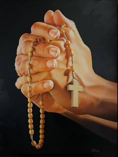 a painting of two hands holding a rosary with a cross hanging from it's end