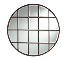 a round mirror that has squares in the middle and sides on it's side