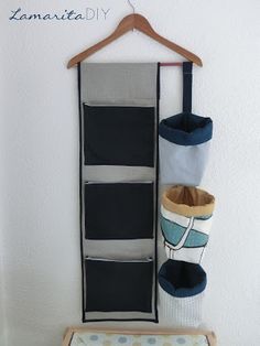 an over the door shoe organizer hanging on a wall