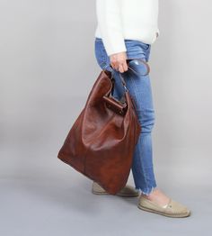 "Oversized bag - large leather tote bag -XXL handbag BROWN LEATHER BAG Height: 46 cm / 18.2\" Width: 43 cm / 17\" Width at the base: 32 cm / 12.6\" Min handle drop: 20 cm / 10.2\" Length of handle: 44 cm / 17.3\" Long strap: max 110 cm / 43.5\" Depth: 13 cm / 5.1\" Large and stylish tote bag made from high quality leather. Spacious interior provides room for all the daily essentials and more. This bag is perfect as your everyday bag, which can fit an IPAD, A4 files, books, magazines, cosmetic ba Large Shoulder Bag With Handles For Errands, Large Brown Satchel For Daily Use, Large Brown Shoulder Bag For Errands, Large Satchel Shoulder Bag For Everyday Use, Large Brown Bags With Double Handle, Large Brown Satchel For Everyday Use, Brown Large Satchel For Everyday Use, Large Rectangular Hobo Bag For Daily Use, Everyday Large Brown Satchel