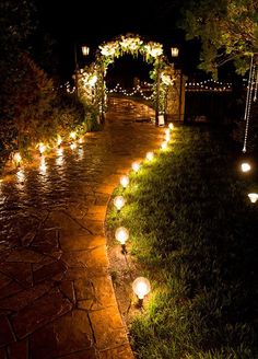 an image of a path that is decorated with lights