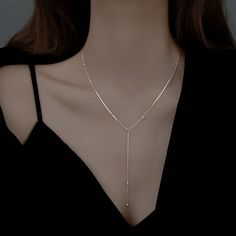 This dainty Lariat Necklace will quickly become one of your favorite pieces of jewelry. It's an excellent item for layering or wearing on its alone. Metal: 925 sterling silver; optional 18k yellow / white / rose gold vermeil Chain style: silver cable chain (from a drop-down menu, select the length of the chain that will go around your neck) Hypoallergenic: nickel-free materials used therefore suitable for those with metal allergies Metal Pendants, Long Tassel Necklace, Pakaian Feminin, Beaded Tassel Necklace, Trendy Necklace, Trendy Necklaces, Birthday Jewelry Gift, Winter Gift, Mood Tracker