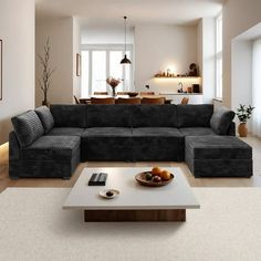 a living room filled with furniture and a table