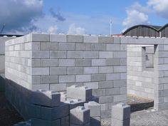 a building made out of cinder blocks under construction