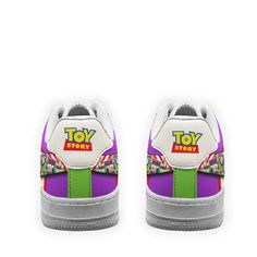 a pair of sneakers with the toy story logo on them, all painted in purple and green