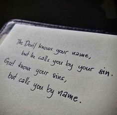 a close up of a piece of paper with writing on it that says the devil knows your name, but he calls you by your sin