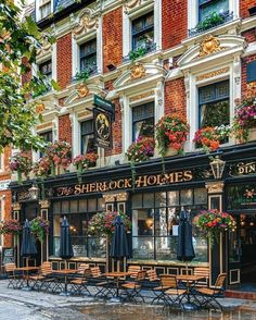 the sherbock hotel in london is decorated with flower boxes and hanging from the windows