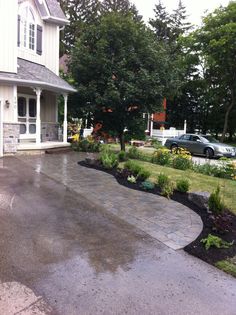 the driveway is clean and ready to be used as a landscaping area for this home