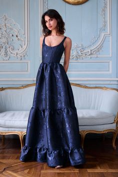 Meet The Avery Dress! She's a beautifully corseted scoop-neck gown with cascading gathered tiers and side pockets. Fall in love with her classic silhouette and darling floral details. Featured in our romantic Navy Baroque Floral brocade, which features navy blue florals on a navy blue background, she's the perfect part Patterned Blue Bridesmaid Dresses, Navy Blue Ball Dress, Navy Bridesmaid Dresses With Groomsmen, Navy Blue Wedding Dresses, Corset Dress Formal, Corset Formal Dress, Off The Shoulder Formal Dress, Snowball Dresses, Navy Wedding Dress