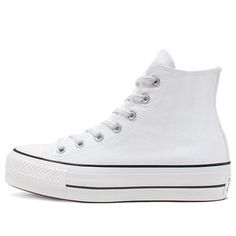 Make a statement with the Converse Chuck Taylor All-Star Hi Platform. Perfect for any occasion, this sneaker will keep you stylish and comfortable in pure white canvas construction. The lace-up closure is secured by matching metallic eyelets and features two inner midfoot eyelets for extra supportive. Along with the rubber toe cap to protect your feet and cushioned insoles, it’s equipped with a sturdy rubber sole provides excellent traction. An iconic look finished off with two black rubber stripes on the outsole, makes this shoe an essential piece to add to your rotation. (SNKR/Casual/Women's/High Top/Pure White) Cute Converse Shoes, All Star Platform, White Chucks, White High Top Converse, Cute Converse, Platform Converse, White High Tops, White Converse, Swag Shoes