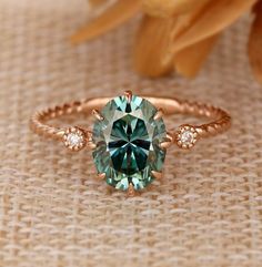 Emerald And Moissanite Ring, Whimsical Emerald Engagement Ring, 3 Stone Birthstone Ring, Blue Green Moissanite Ring, Emerald Engagement Ring Rose Gold, Oval Cut Emerald Ring, Emerald Antique Ring, Green Montana Sapphire Engagement Ring, Emerald Oval Engagement Ring