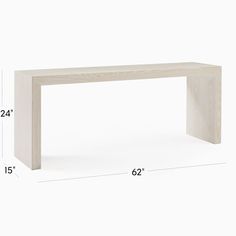 a white table with measurements for the top and bottom section, including an angled edge