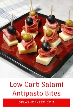 low carb salami antipasto bites on a red plate with olives