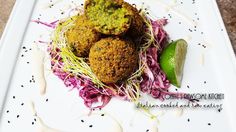 some food is on a white plate and garnished with sprout leaves