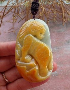 Certified Hand Carved Green Yellow 100% Natural Burma A Jade jadeite Tiger Zodiac Pendant Necklace Include Jewelry Pouch ** Free ** Include Jewelry String Cord (Free) All of our pendant will separate come with a string cord. JADEITEUndyed, 100% Natural Burma A Jade Jadeite SIZE 66mm X 37mm X 13mm Color* See Photo * CertificateAll Jadeite come with certificate Tiger Zodiac, Zodiac Pendant Necklace, Zodiac Pendant, Jewelry Pouch, Myanmar, Green Yellow, Necklace Etsy, Jewelry Necklace Pendant, Hand Carved