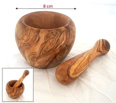 a wooden bowl and spoon are shown with measurements for each item in the image below