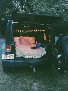 there is a bed in the back of a truck