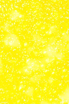 an orange and yellow background with lots of small white dots on the top right corner