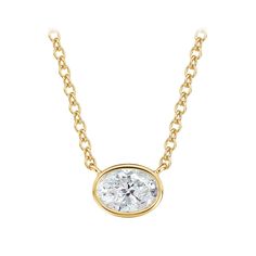 a yellow gold necklace with a white diamond in the center and a chain around it