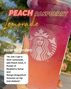 a woman holding up a pink drink in front of her face with the caption peach raspberry lemonade