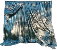 an image of a blue curtain that is draped in metallic foil on a white background