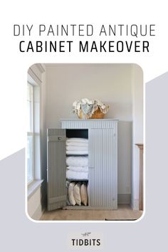 a white cabinet with towels in it and the words diy painted antique cabinet makeover