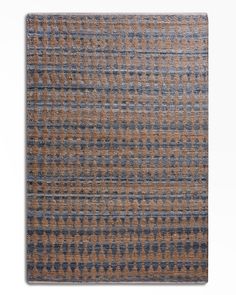 a brown and blue rug on a white background