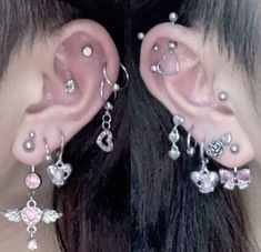 a close up of a person with ear piercings on their ears and behind the ear