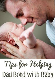 a man holding a baby in his arms with the words tips for helping dad bond with baby