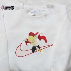 a white sweatshirt with a cartoon character on it