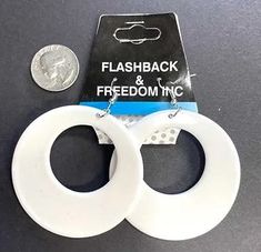 This pair of pierced big hoop white acrylic plastic earrings is perfect for Disco, 70's 80's accessories, Halloween, pop stars, theatrical productions, cosplay, school spirit events and more! Other costumes and accessories are sold separately on our page – subject to availability. One size fits most teens and adults.